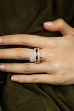 APM Ring - Monaco safety pin ring in tricolor, close-up on hand