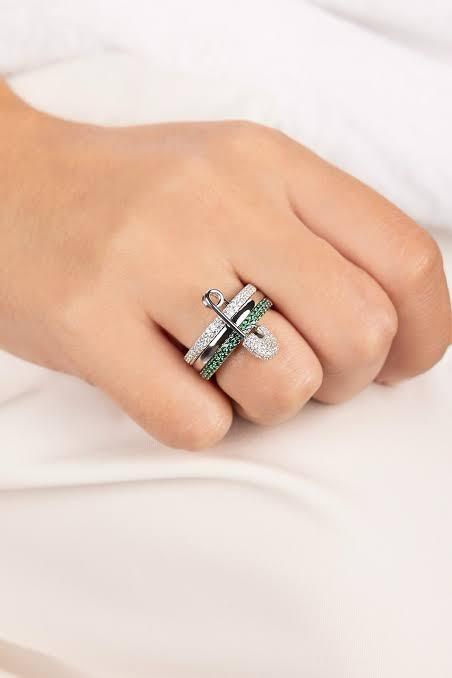 APM Ring - Monaco safety pin ring in silver with green stones, worn on hand