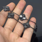 VCA Bracelet - Full Black, held in hand