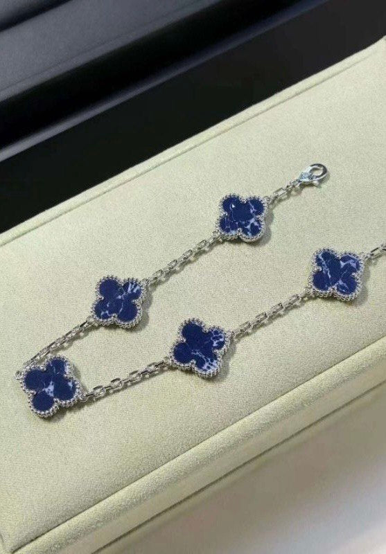 VCA Bracelet - blue stone clovers on silver in the presentation case